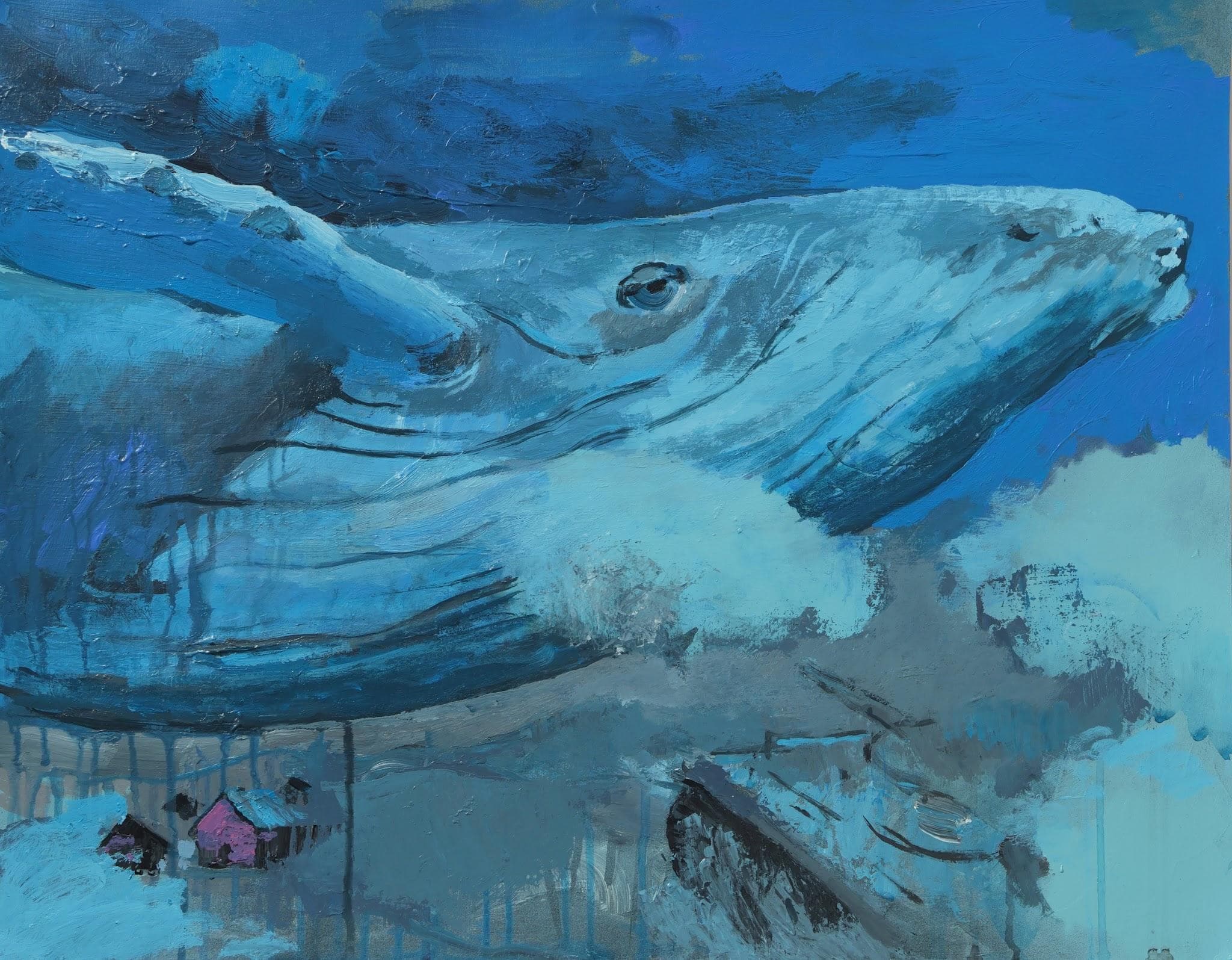 Una ballena azul nada por encima de los tejados; abajo a la izquierda, una casita de tejado rosa